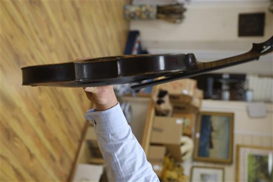 A mid 19th century German violin, bears Nicolas label, cased with a silver mounted bow, back 36cm